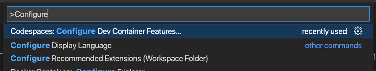 The Configure Devcontainer Features command in the Command Palette